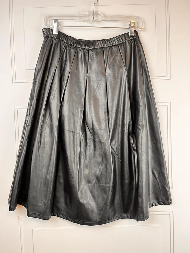 Falda de fiesta de cuero sintético negra talla 4 cremallera lateral longitud media forrada estilo elástico Foto 2 de 4