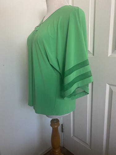 Top Joseph Ribkoff Island verde malla inserción manga Dolman cremallera frontal talla 8 nuevo con etiquetas - Imagen 8 de 10