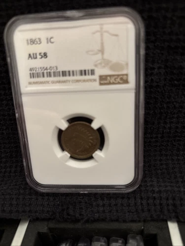 NGC AU-58 1863 Indian Head Cent, Richly Hued, Lustrous specimen.