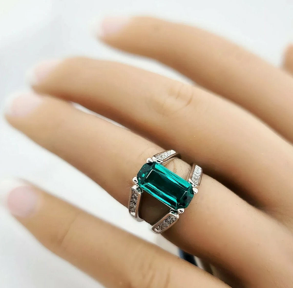 Lab created emerald and diamond 14kt white gold ring deals