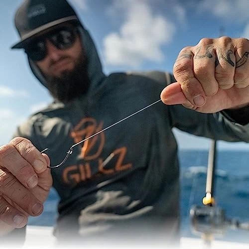 Líder de línea de pesca 100 % FLUOROCARBONO - transparente 0,017 pulgadas / 0,42 mm, 20 lb, 25 yardas Foto 4 de 4