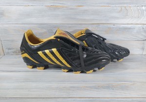 black and gold predator boots