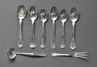 MIXED LOT OF 7 STERLING SILVER SPOONS AND A STERLING SILVER FORK