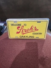 MINT  Michigan Booster License Plate Welcome To Stroh's Country Grayling MI 