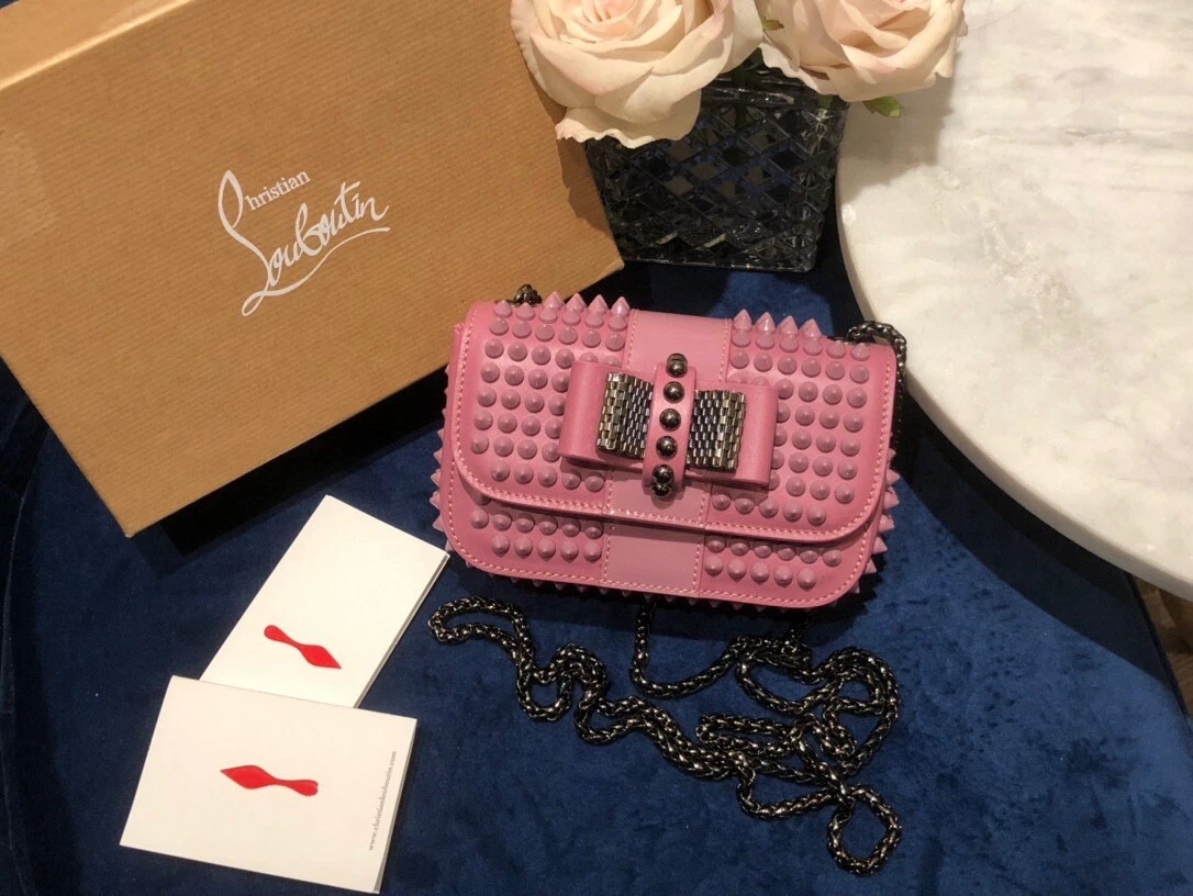 AUTH CHRISTIAN LOUBOUTIN PINK STUDDED SPIKES SWEET CHARITY BOW CROSS BAG