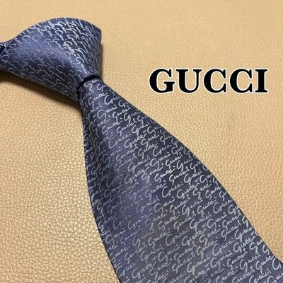 Gucci Krawatte, GG Muster, gestreift, gepunktet, kariert, Farbe blau.
