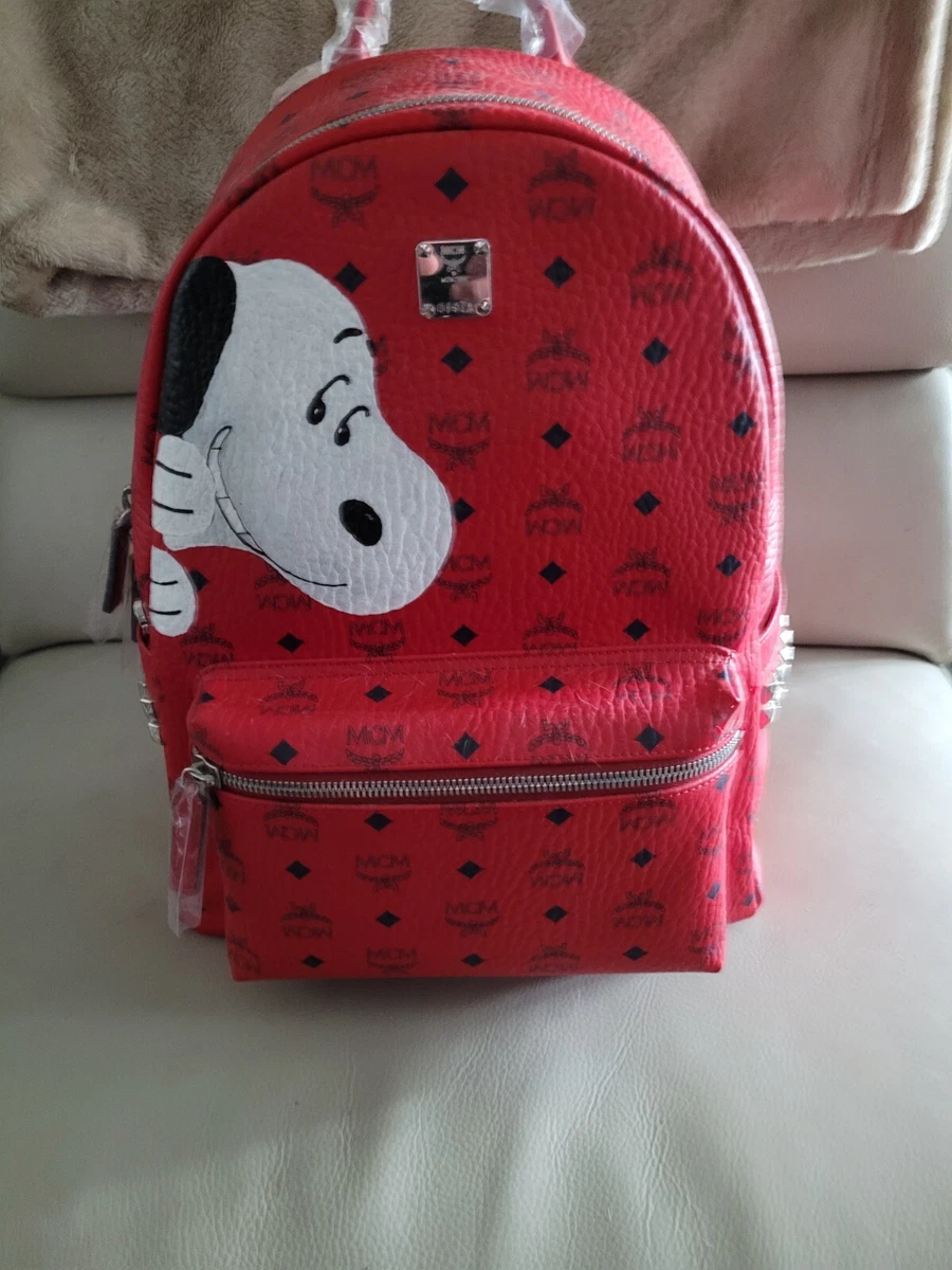 Authentic Brand New MCM Backpack with Dog plush, Women's Fashion, Bags &  Wallets, Backpacks on Carousell