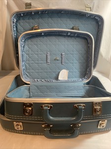 light blue suitcase
