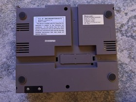 Nintendo NES with 12 games, 2 controllers, game pad, & zapper. Great condition!!