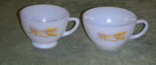 TWO (2) ~ FIRE KING  WHEAT Pattern ~ Milk Glass Coffee Cups ~ One Footed