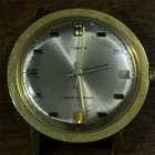 Timex Vintage 1960s Manual Wind Gold Tone 34mm Silver Dial Watch Black Band