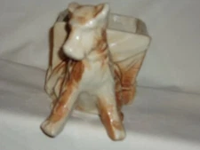 Vintage Mc Coy dog with cart planter, circa 1952