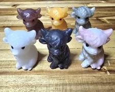 Crystal Sitting Highland Cow Carving