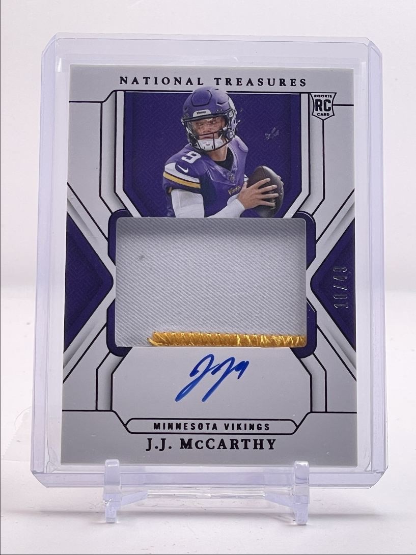 J.J. McCarthy 2024 National Treasures #156 Purple True Rookie Patch Auto RC /49