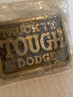 DODGE TRUCK BELT BUCKLE VINTAGE BRASS RECTANGULAR TRUCK IT TOUGH DODGE. NOS