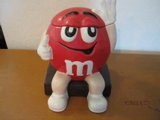 2000 M & M  COOKIE JAR ,NICE SHAPE NEEDS A CLEANING, DUSTY FROM DISPLAY.
