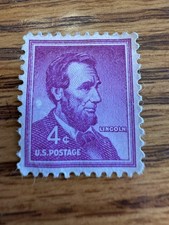 Abraham Lincoln 4 cent stamp purple, very collectible , not cancelled. Gem!
