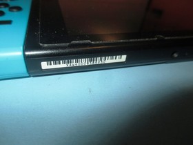 Nintendo Switch System Console w/Neon Red & Blue Joy-Cons + Dock & Extras