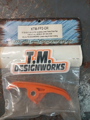 T.M. design works-KTM-FP2-OR-LOWER CHAIN GUIDE PAD, ORANGE