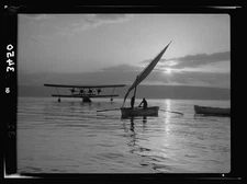 Northern views,Lake Galilee,Fisherman,Rowing fishing boat,furled sail at