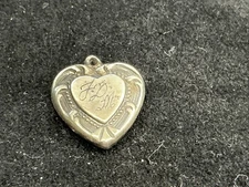 Vintage Sterling Puffy Heart Charm with Offset Repousse Swirl Design