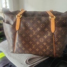 Louis Vuitton Monogram Brown Zip Shoulder Bag...
