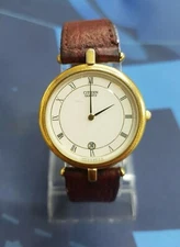 Vintage Citizen 611 sy-63623 gold tone date white dial