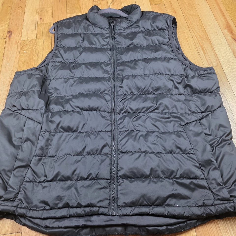 Chaleco acolchado negro Champion para hombre talla XXL cremallera bolsillos delanteros Foto 2 de 4