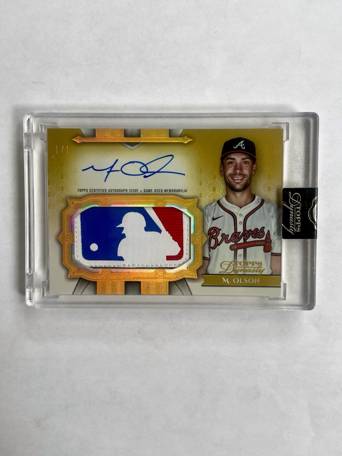 Matt Olson 2024 Topps Dynasty Logoman MLB Logo Patch Auto 1/1 Braves Card view 1
