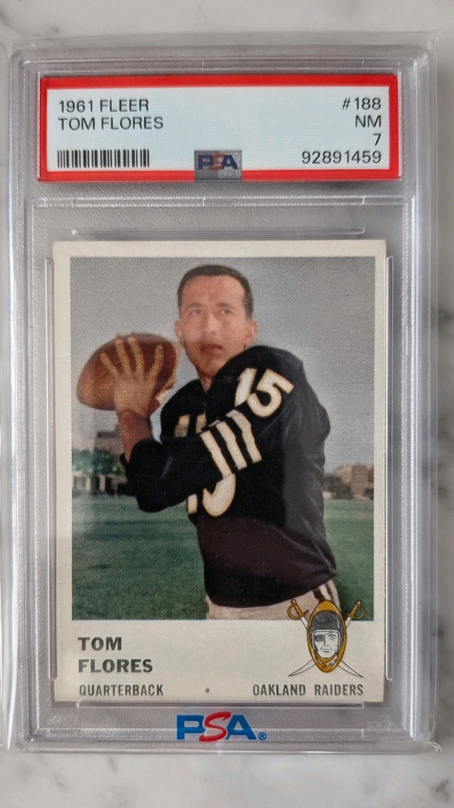 1961 Fleer - Tom Flores #188 (RC) PSA 7