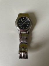 Citizen Eco-Drive Titanium Quartz Men's Watch with Date E110