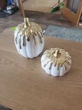 Two White And Gold Pumpkins