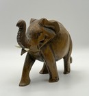Hand Carved Wooden Elephant Figurine Raised Trunk Tusks Animal Ornament