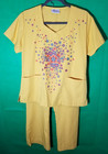 Reina Scrub Set Woman S Concentric Circle Design Floral Cluster Mustard Nurse