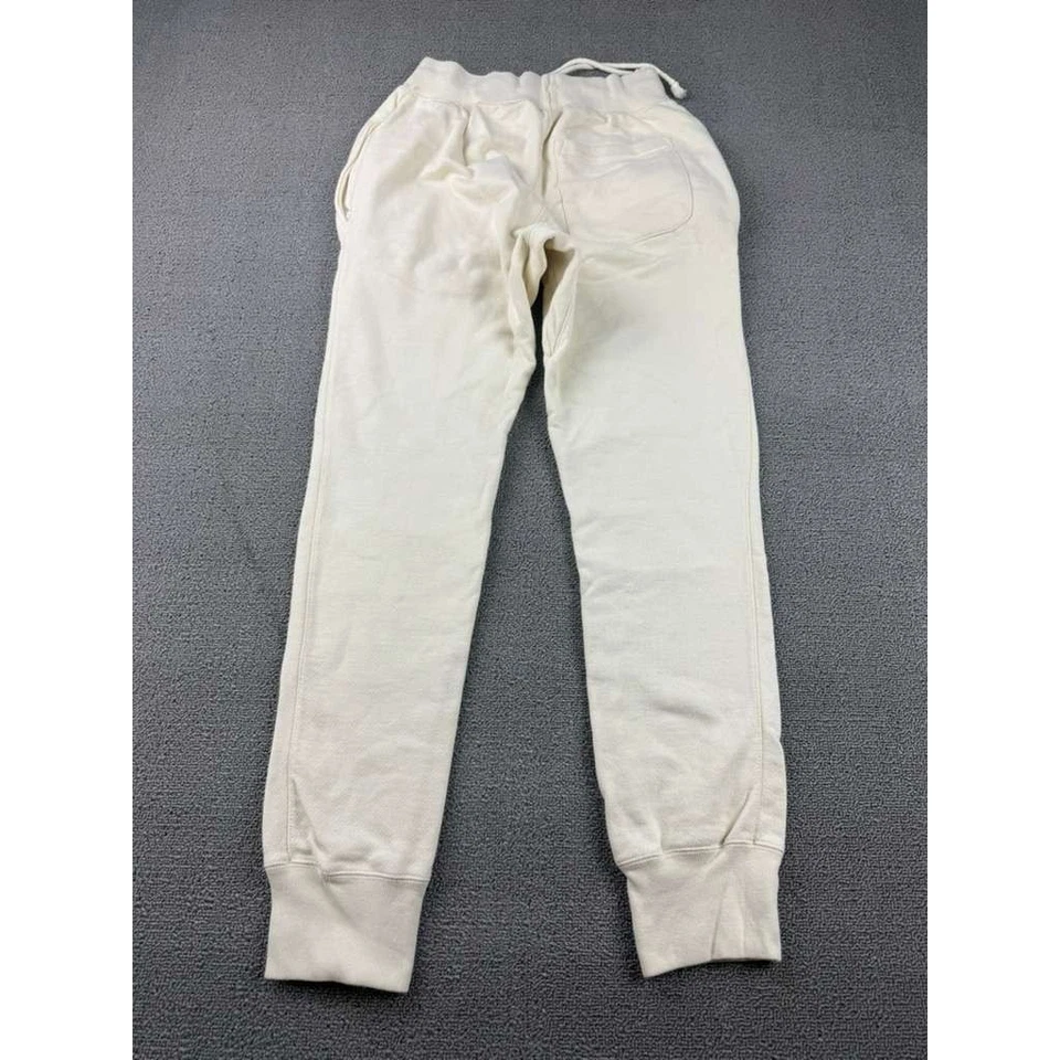 Pantalones deportivos Champion tejido inverso para mujer S blancos parche con logotipo de jogger cordón Foto 2 de 4