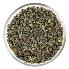 Peach Oolong Flavored Leaf tea. 3oz
