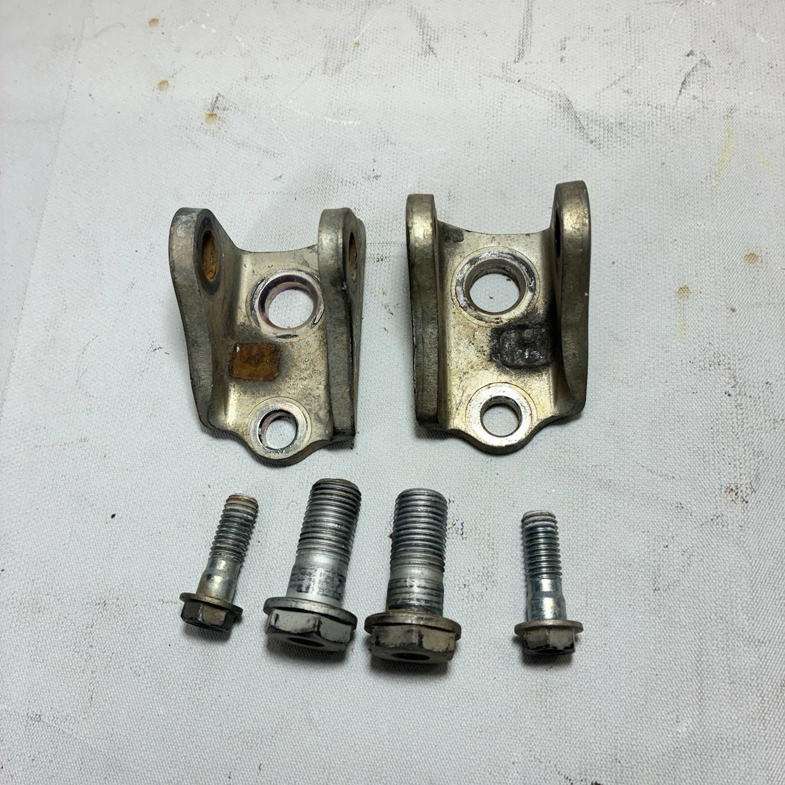 04-07 2006 Honda CRF250X Foot Peg Mounts Brackets Set Left & Right OEM