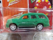 WHITE LIGHTNING 2004 CADILLAC ESCALADE JOHNNY LIGHTNING POKER SERIE 1:64