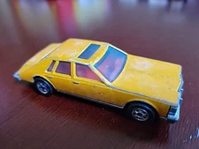 1980 Hot Wheels Cadillac Seville Gold Black Wall Tires