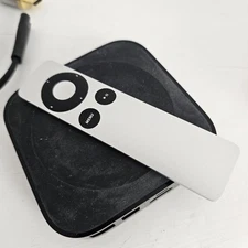 The image displays the packaging label for an Apple TV (3rd generation) media...