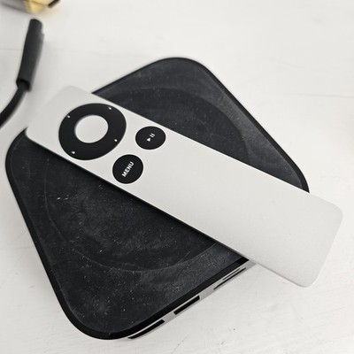 The image displays the packaging label for an Apple TV (3rd generation) media...