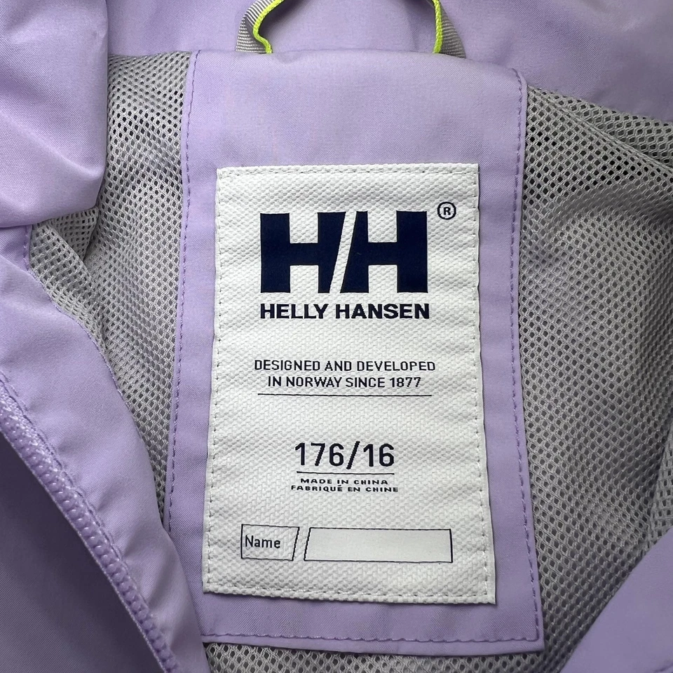 Chaqueta cortavientos Helly Hansen para mujer 16 púrpura con capucha resistente al agua logotipo HH Foto 4 de 4