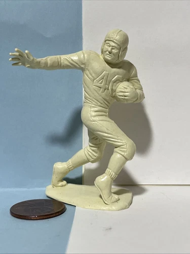 Football player Marx Sports plastic figure miniature athlete dime store toy