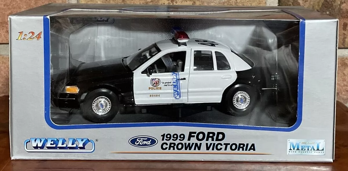 1999 FORD CROWN VICTORIA POLICE CAR BK WT W CASE 1 24 BY WELLY