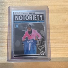 2025 Panini Mosaic -Travis Hunter Notoriety #12 Rookie (RC) Jaguars B-21