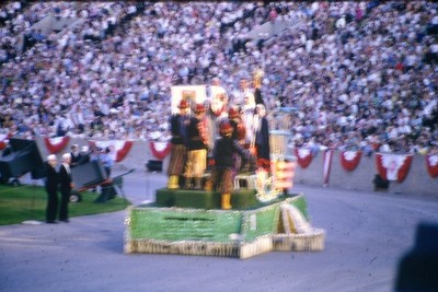 c1960's Kodachrome 35mm Slide Stadium Parade Float Spectators USA Football Flag