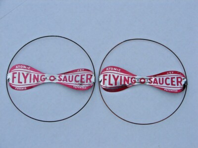 2 Vintage 1950s Atomic Flying Saucer Formis Jet metal toy helicopter toys 