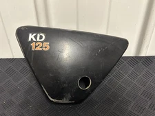 1976-1979 Kawasaki KD 125 used Left Side Oil Tank Side Cover Panel