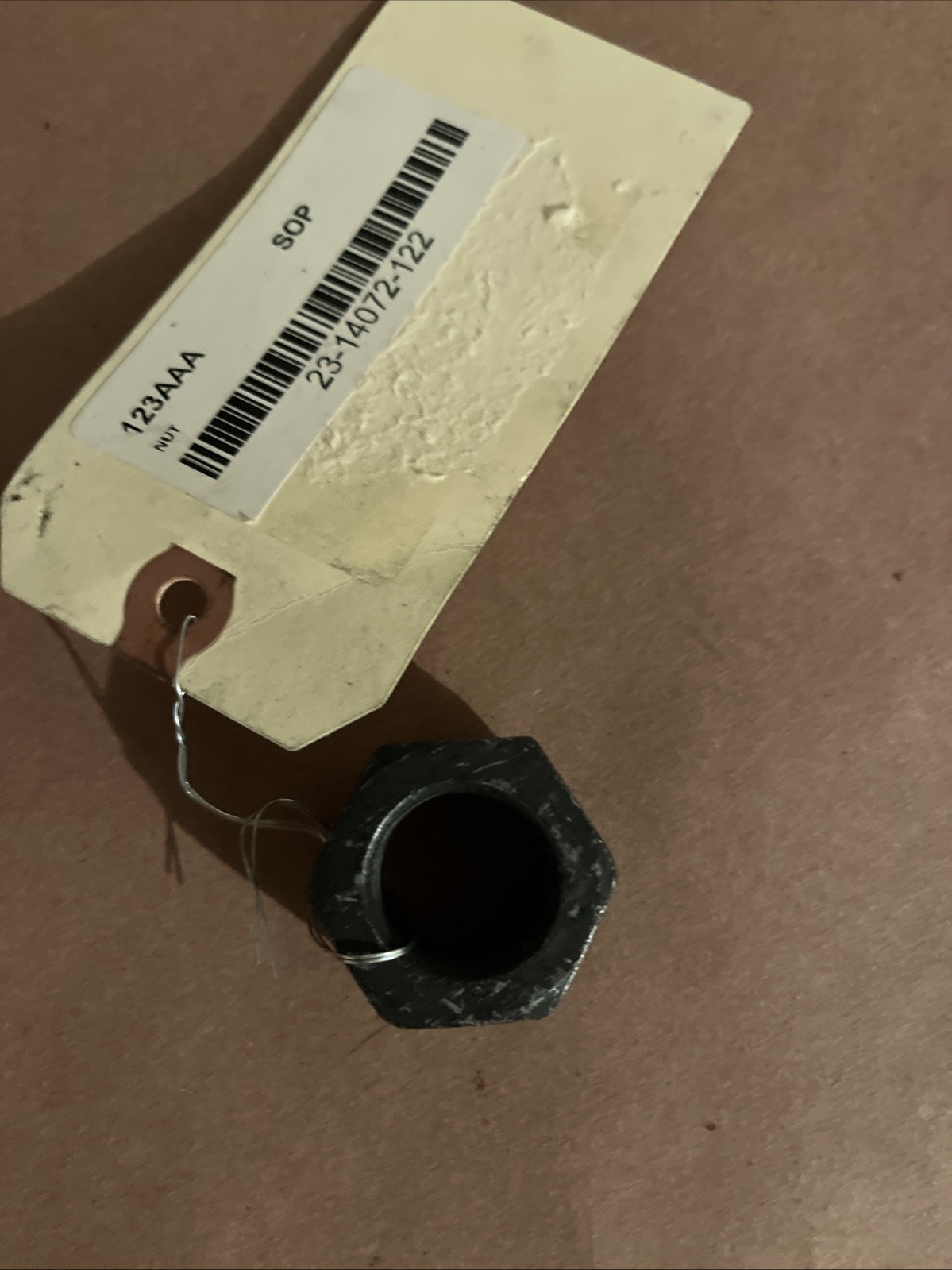 FREIGHTLINER HEXAGONAL LOCK NUT M22 x 1.5 BLACK, 23-14072-122 | Parts Masters image 1
