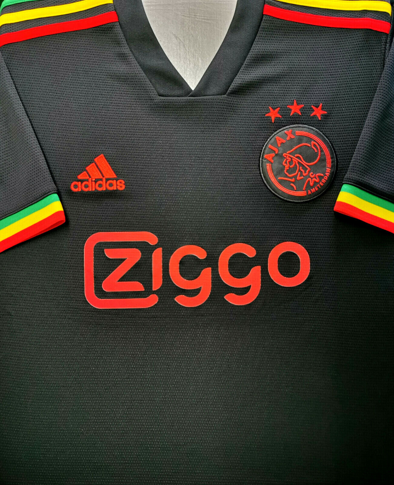 Details zu  Trikot Adidas Ajax Amsterdam 2021-2022 Third UCL - Haller 22 I League Bob Marley Hochwertiger Versandhandel